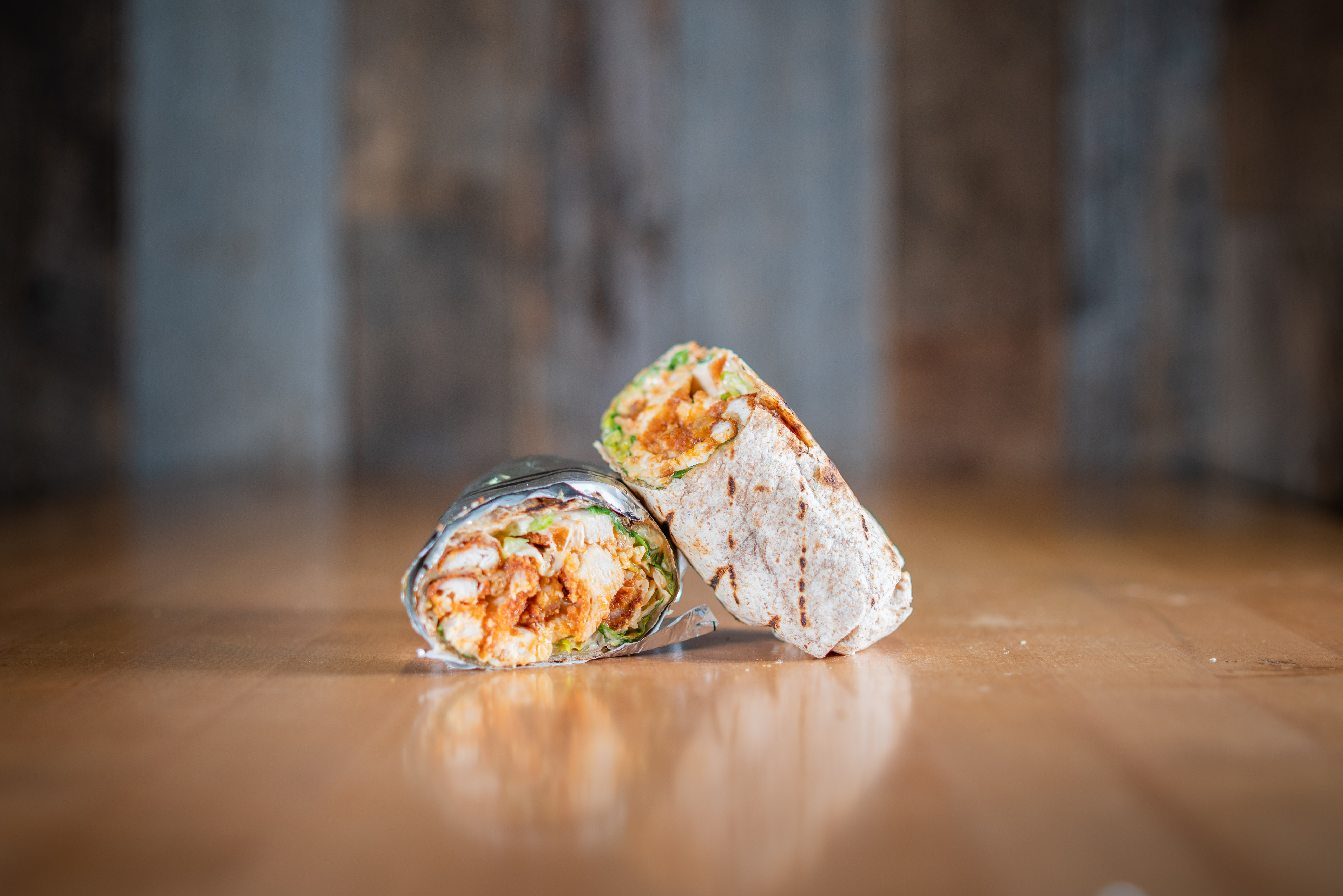 Buffalo Wrap - Halal crispy chicken patty, hand-breaded fresh dai...
