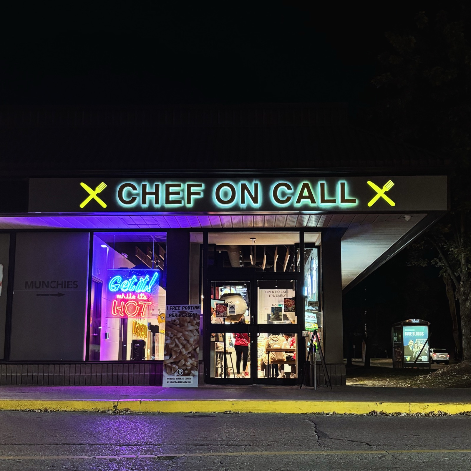 Chef On Call London location at night with glowing signage