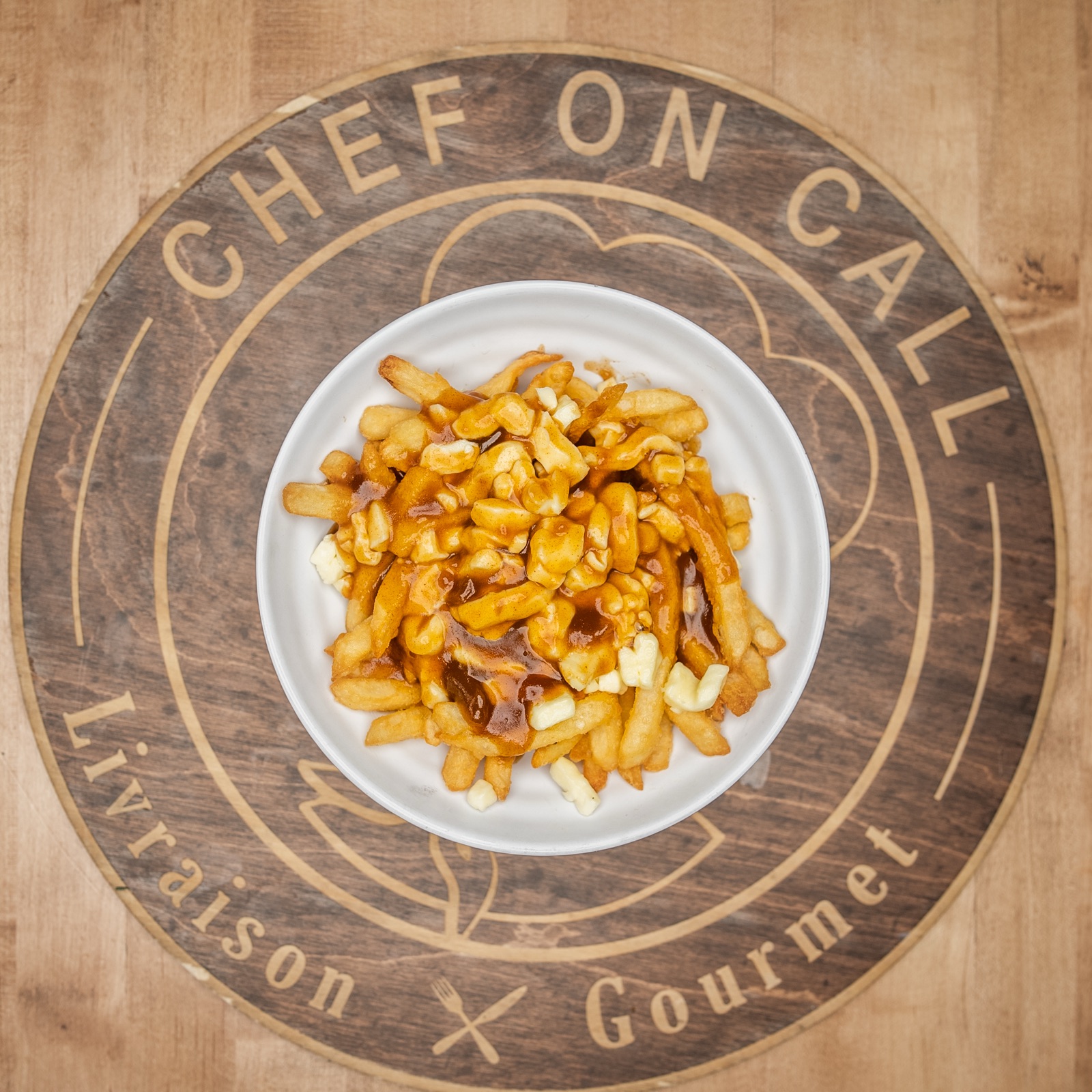 Chef On Call OG Poutine on branded table